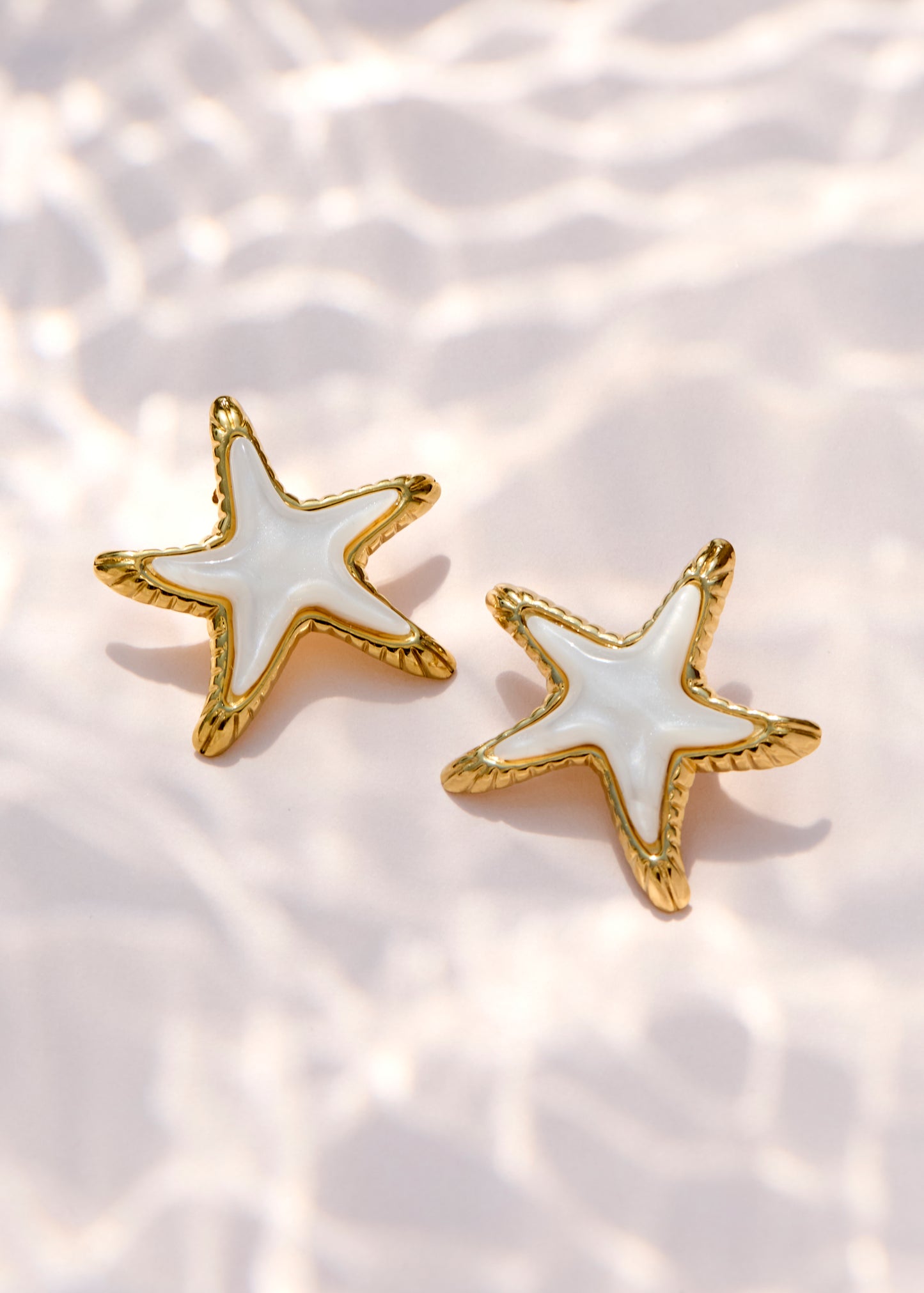 Stellaria - Boucles d’oreilles étoile de mer dorées