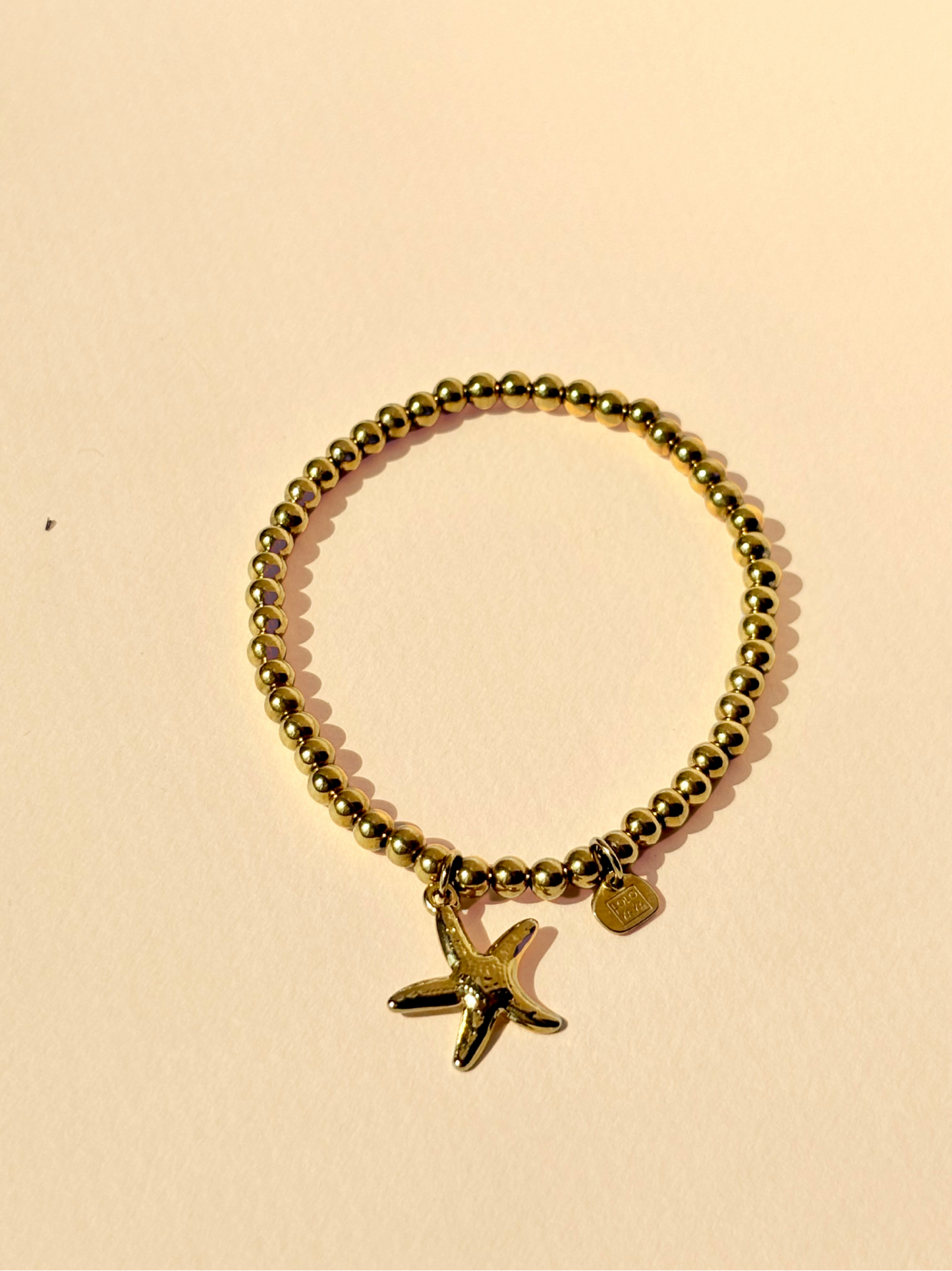 Bracelet élastique doré – Étoile