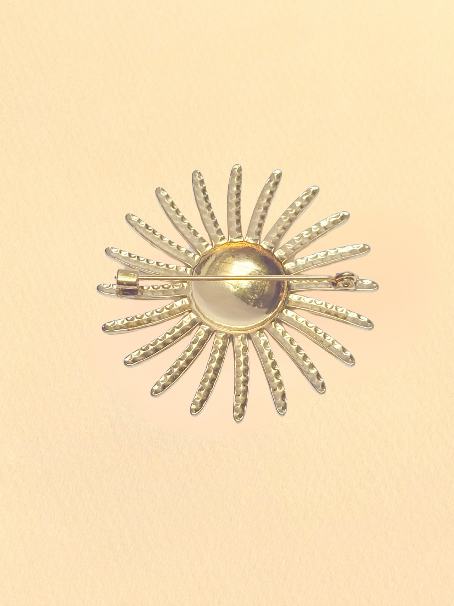 Broche soleil dorée