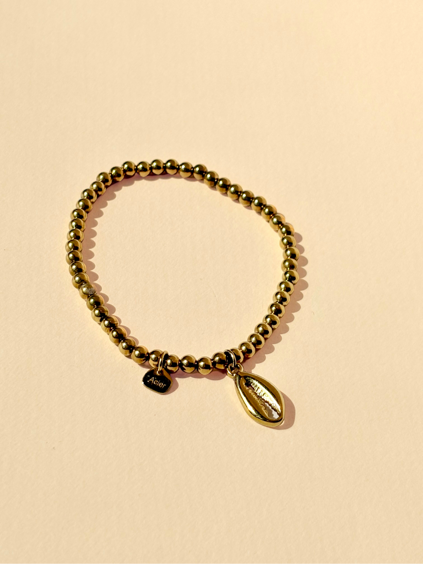 Bracelet élastique doré – Coquillage doré